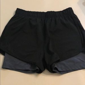 Black shorts with gray liner for runners